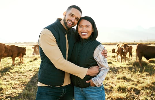 Cow, farm and couple portrait on field in countryside for meat, beef or cattle food industry. Happy people, man and woman farming livestock, cows or animals in agriculture, sustainability and ecology