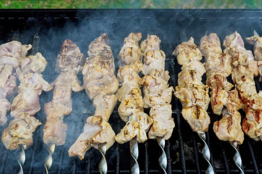 Process of frying meat on charcoal in the shish kebabs are fried a classic barbecue