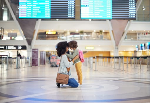 Black woman, girl kid and welcome in airport with head together, love or greeting with hug. Family, mother and daughter for reunion, embrace and happy for global travel, transportation or immigration.