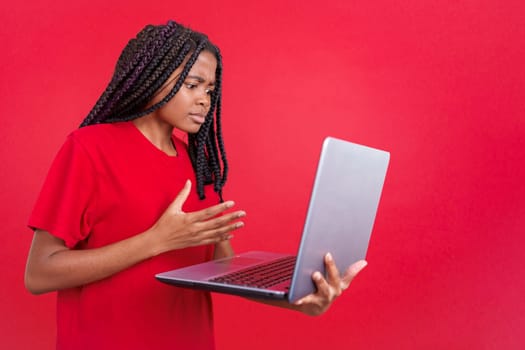 African woman having a problem with a laptop