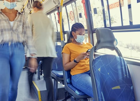 Travel, covid and woman on a bus with face mask for compliance, safety and bacteria protection in a city. Corona, public transport and girl riding busy transportation downtown during global pandemic.