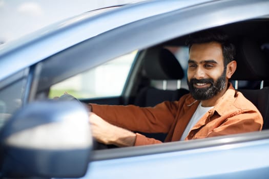 Bearded Arabic Driver Guy Posing In Automobile With Opened Window