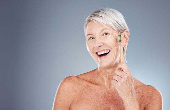 Dental, wellness and portrait of old woman with toothbrush in hand on gray background studio. Eco friendly, oral hygiene and senior female with bamboo brush for clean teeth, dental care and dentist.
