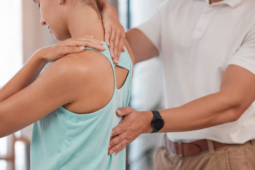 Physiotherapy, chiropractor and physical therapist with woman patient for stretching and spine massage for health and wellness. Man and client at chiropractic for physical therapy consultation at spa
