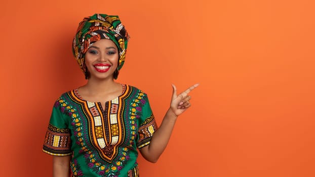 Pretty african woman showing copy space for advertisement