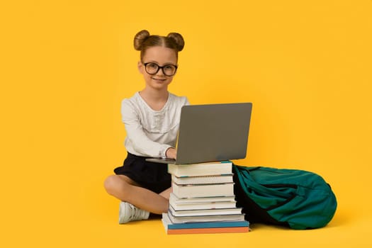 Modern Education. Portrait Of Cute Little Schoolgirl Using Laptop Computer