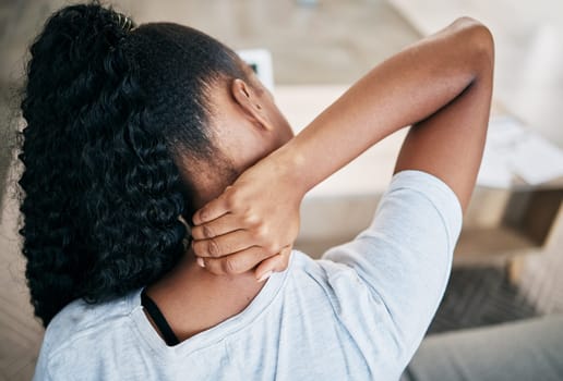 Neck pain, stress and back of black woman on sofa with injury, joint inflammation and arthritis. Health, medical care and girl massage muscles for relief from strain, muscular tension and body ache
