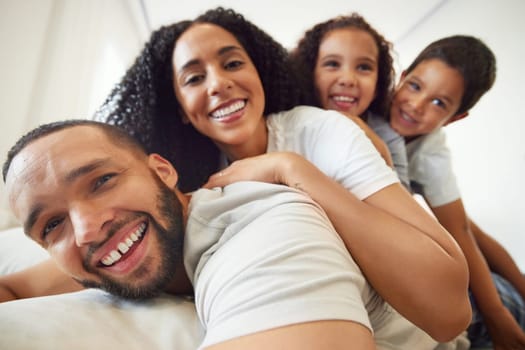 Happy family, portrait and selfie with children and parents relax, play and having fun in their home together. Face, smile and African kids laugh with mother and father for photo while bonding