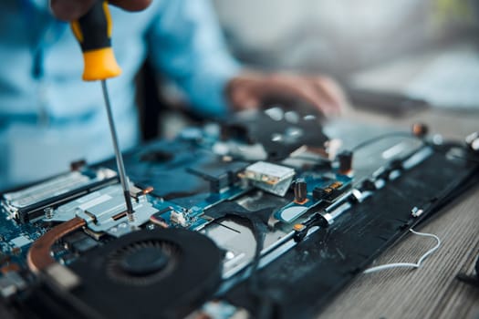 Screwdriver, motherboard circuit or Information technology man fixing laptop hardware, electronics or semiconductor. CPU system maintenance, service industry or IT worker repair microchip in tech lab
