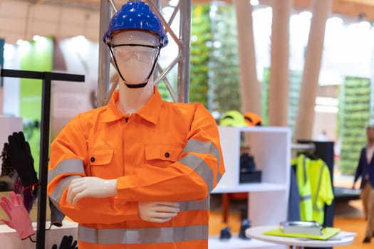 Construction workwear overalls on a mannequin at the expo