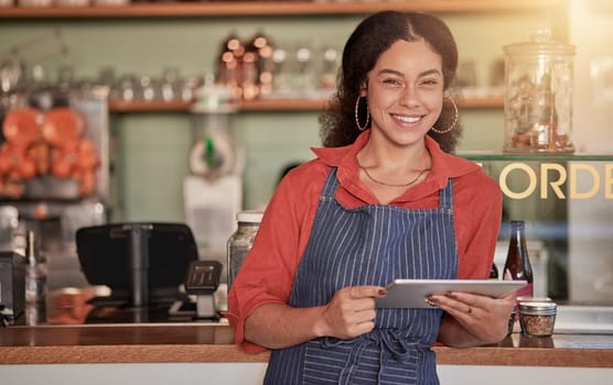 Portrait, restaurant waiter and woman with tablet to manage orders, inventory and stock check. Coffee shop barista, technology and happy female waitress holding digital touchscreen for managing sales
