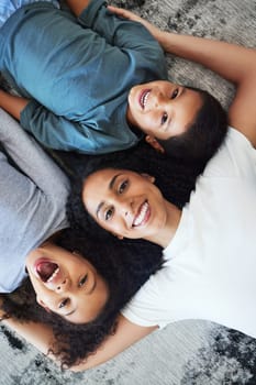 Top view, family and portrait of mother with kids in home, having fun and laughing at funny joke. Love, care and happy mama with girl, boy or children, bonding and enjoying quality time together.