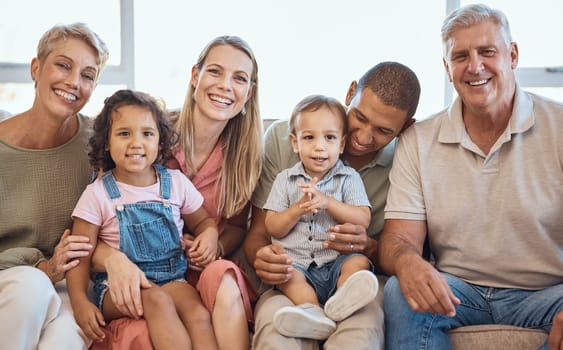 Big family, home sofa and happiness portrait with children, parents and grandparents together for love, support and care for quality time. Interracial men, women and kids in house to relax and smile
