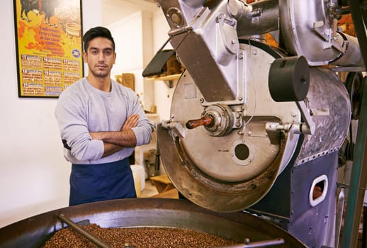 Coffee is a way of life. a machine grinding and roasting coffee beans.