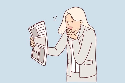 Joyful businesswoman with newspaper is surprised by good news in press and says WOW covering mouth