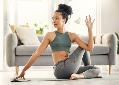 Stretching, body and yoga by woman on living room floor, training or mental health exercise at home. Arm, stretch and lady with flexible fitness or pilates, workout or balance, meditation or wellness