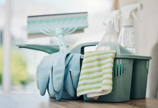 Cleaning supplies, product and chemical spray with cloth and gloves, household maintenance and service. Closeup of cleaner tools in basket, janitor equipment and disinfectant with sanitizer detergent