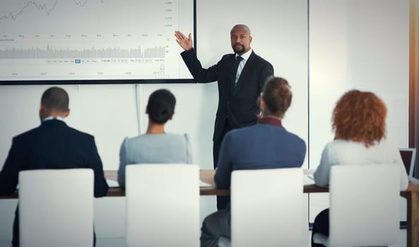 Question, coworkers in a business meeting and training in a boardroom of their workplace. Data review or strategy, collaboration or teamwork and coworkers in a conference for statistics or planning