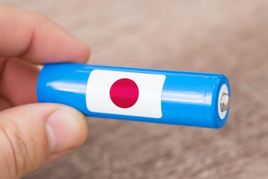 Flag of Japan on rechargeable li-ion battery