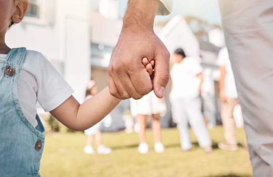 Closeup, parent or child holding hands in new home or real estate as family bonding with love or care. Support, embrace or guardian with a young kid with affection moving in to house property grass