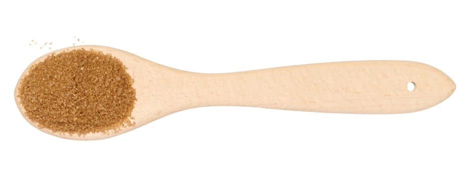 Wooden spoon with brown cane sugar on a white background, top view
