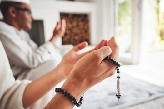 Muslim pray, beads and hands, Islamic faith with worship and trust in God with peace and religion. Trust, spiritual and Islam with gratitude, respect and people praying in the Mosque with devotion