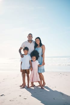 Vacation, beach and portrait of happy family together at the sea or ocean bonding for love, care and happiness. Travel, sun and parents with children or kids on to relax in mockup space on holiday