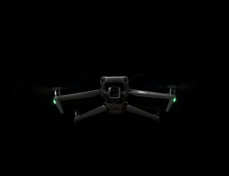 DJI Mavic 3 - in Flying in the dark, on black background. Closeup drone on dark. One of the most popular drones in the market. Modern reconnaissance copter camera. 12.01.2022 Rostov-on-Don. Russia
