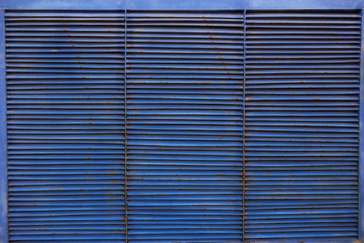 abstract background blue metal grille blinds stripes.