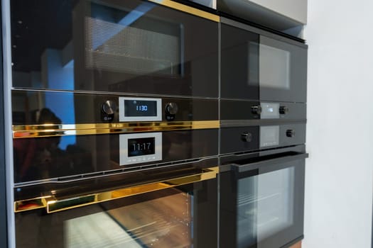 New ovens in household appliance section in store