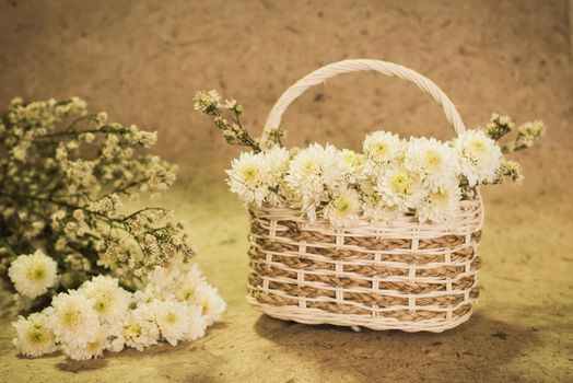white flowers on basket vintage