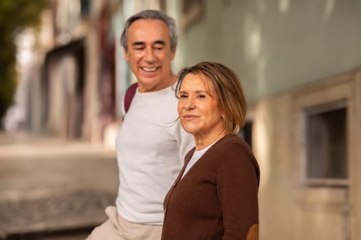 Portrait Of Senior Tourists Couple Walking Outdoors, Selective Focus