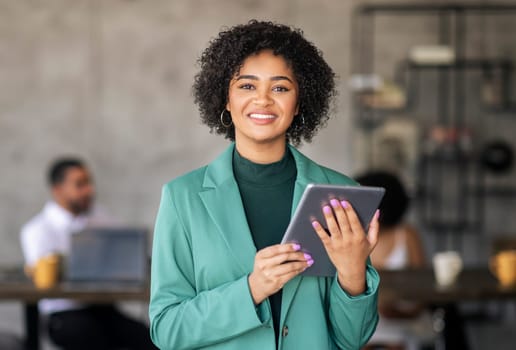 Smiling Black Lady Posing With Digital Tablet Standing In Office