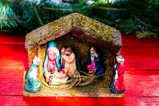 Colorful Nativity Scene with baby Jesus against Christmas background