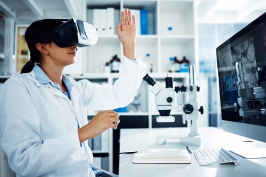 Woman, scientist and VR goggles with computer screen, science innovation in lab and futuristic tech with metaverse. Virtual reality, digital data and UX with scientific experiment and female doctor