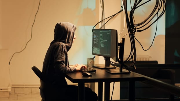 Female hacker committing cyberattack on server firewall