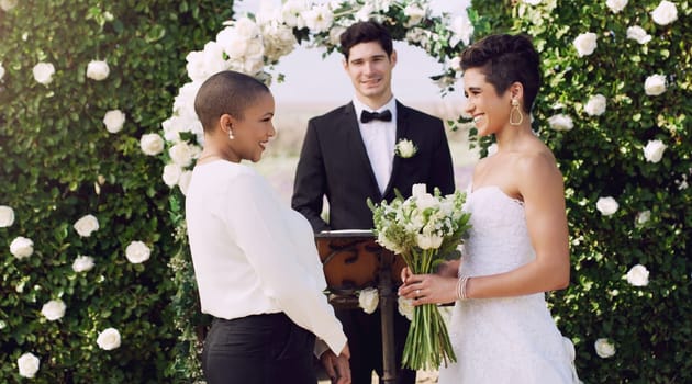 Love, marriage and lgbtq with lesbian couple at wedding for celebration, happy and bride pride. Smile, spring and ceremony with women at event for partner commitment, queer romance and freedom