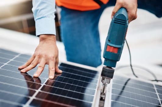 Solar panel, drill and engineering with hands of man for renewable energy, project and power. Construction, electricity and sustainability with closeup of contractor for tools, photovoltaic and grid