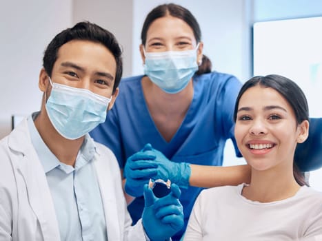 Portrait of dentist and woman with retainer for teeth whitening, service and dental care. Healthcare, dentistry and orthodontist with dentures for patient for oral hygiene, wellness and consulting
