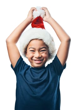 Christmas hat, face and excited child with celebration and funny portrait isolated on transparent png background. Happy, play and asian kid or boy celebrate holiday, arms in air and take off costume