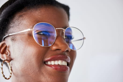 Happiness, glasses and black woman with positive face with vision in studio background with nerd in closeup. Style, thinking and geek girl with beauty or happy expression with eye wear or smile.