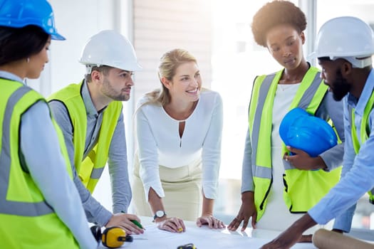 Construction team, business people and blueprint with planning, builder group or contractor. Industrial, maintenance conversation and document for safety, engineering job and architecture project