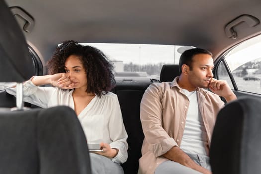 Displeased Middle Eastern Couple Expressing Unhappiness After Conflict In Car