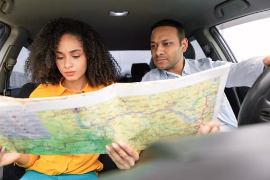 Confused Eastern Spouses Lost During Travel By Auto, Holding Map
