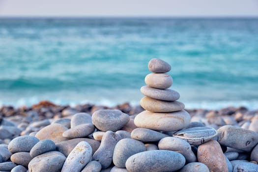 Zen balanced stones stack on beach