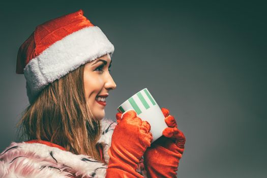 Christmas Girl With Cup Of Tea