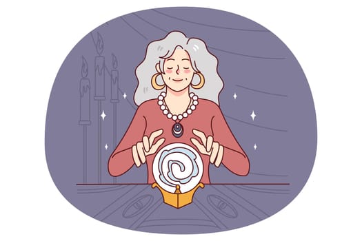 Witch with crystal ball telling future