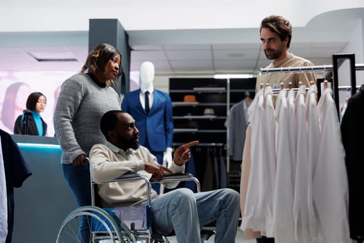 Man in wheelchair shopping with friend