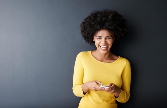 Funny, social media and portrait of black woman using phone and laugh at meme, post or article online. Cellphone, app and person typing contact or communication on internet or website in mockup space