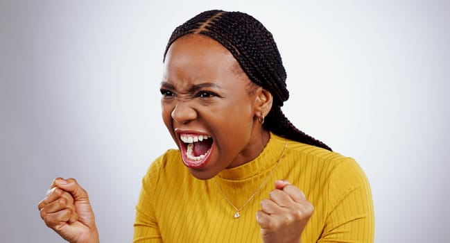 Angry, black woman and frustrated face with scream, shout and yelling in studio white background. Crisis, stress and person voice anger, rage or crazy emoji with problem, mistake or annoyed with fail